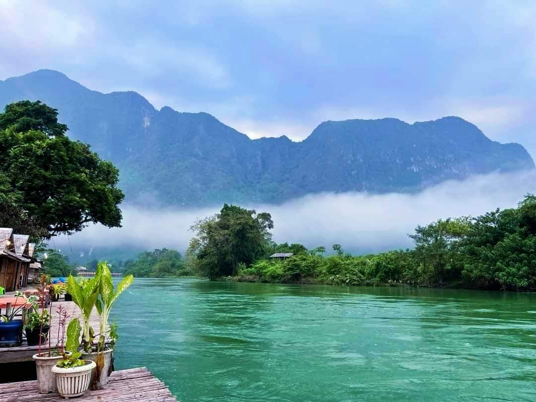 Mekong River cruise in Laos, showcasing stunning landscapes for Laos tourism.